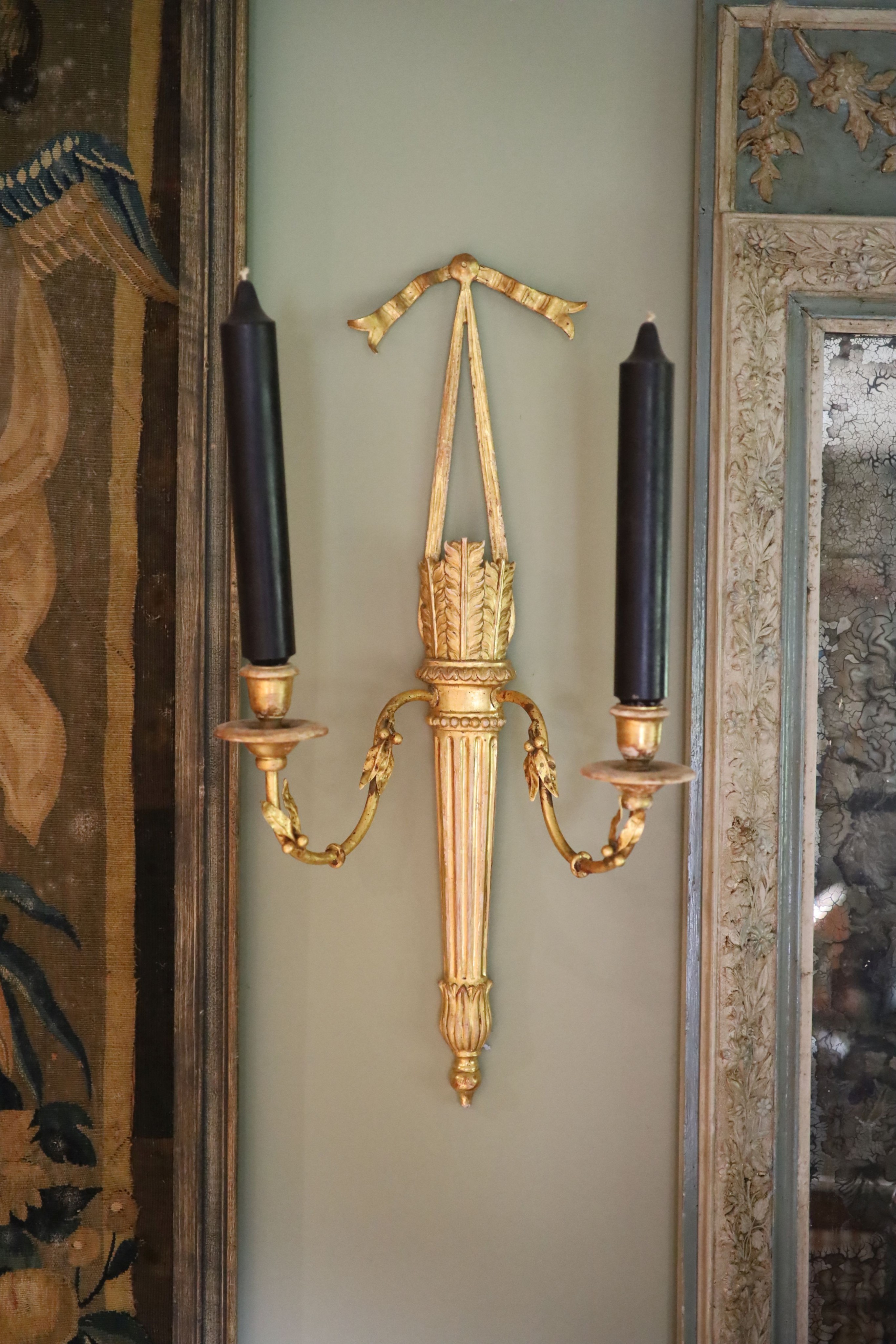 A set of four Georgian style giltwood and gesso twin branch wall lights modelled as quivers, with fruiting branches, height 61cm width 30cm
